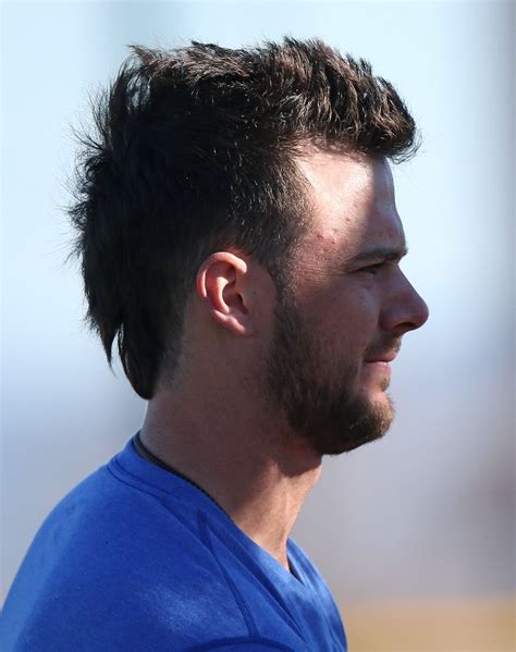 Kris bryant haircut - Mar 29, 2023 · A gallery of Kris Bryant's hairstyles from Fohawk to Spikes, with ratings and tips on how to style them. Learn about his hair type, facial hair, and how he alternates between different looks for different occasions. 
